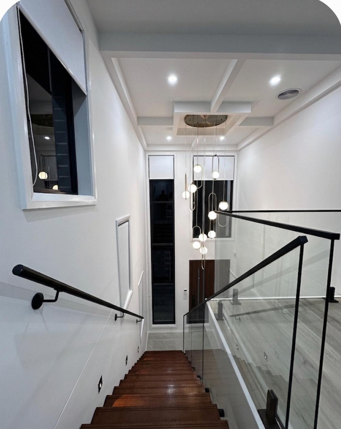 Polished Wood Staircase and Modern Balustrade